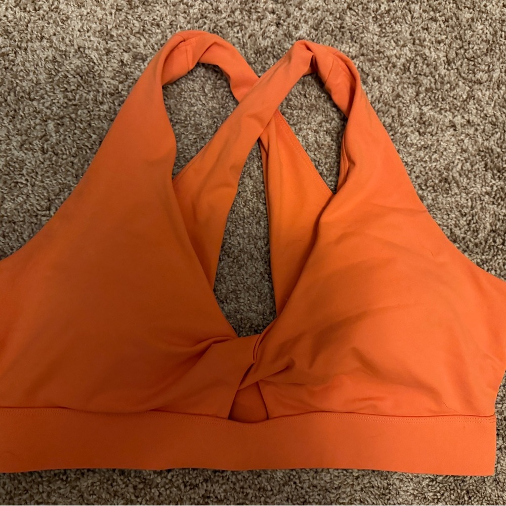 Fabletics Oasis Twist Medium Impact Sports Bra Twist Front Orange Sports Bra